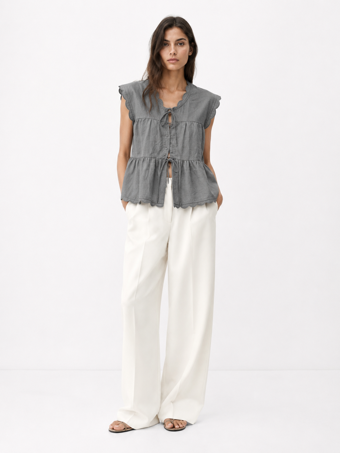 Natural Linen Sleeveless Babydoll Top with Wave Ruffles & Tie Detail